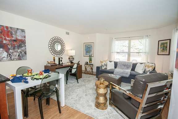 Living room area with natural lighting at Centennial Place in Atlanta, Georgia