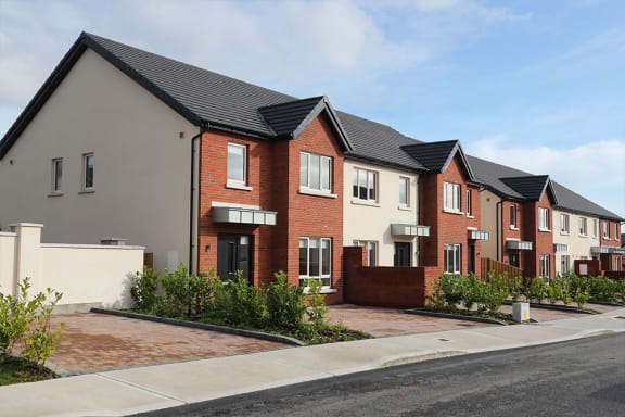 a row of new town houses on a street