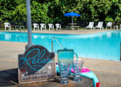 Thumbnail 10 of 17 - Sparkling Swimming Pool at River Mews Apartments and Townhomes near Langley-Fort Eustis in Newport News, VA
