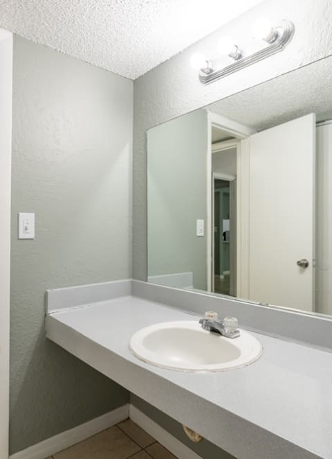 Bathroom sink at Bella Mar Apartments