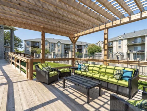 Outdoor pool with view of pergola at Eagle Run Apartments in northwest Omaha 68164