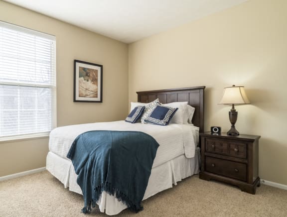 Interiors-Master bedroom with king-sized bed at Ridge Pointe Villas