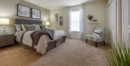 Large bedroom with double closet and window in 2 bedroom apartment for rent in Charleston SC
