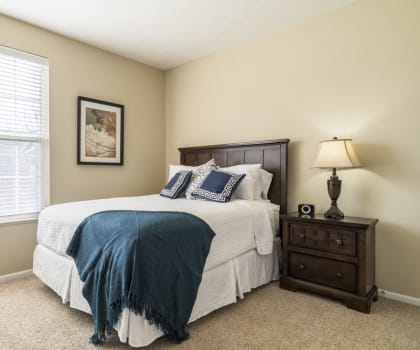 Interiors-Master bedroom with king-sized bed at Ridge Pointe Villas