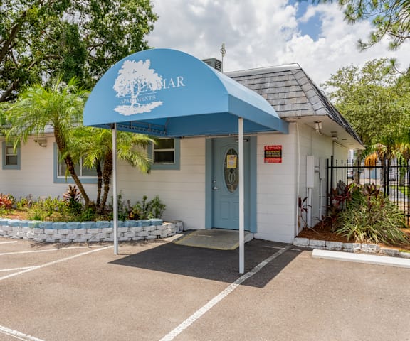 Exterior of leasing office at Bella Mar Apartments