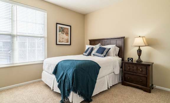 Interiors-Master bedroom with king-sized bed at Ridge Pointe Villas