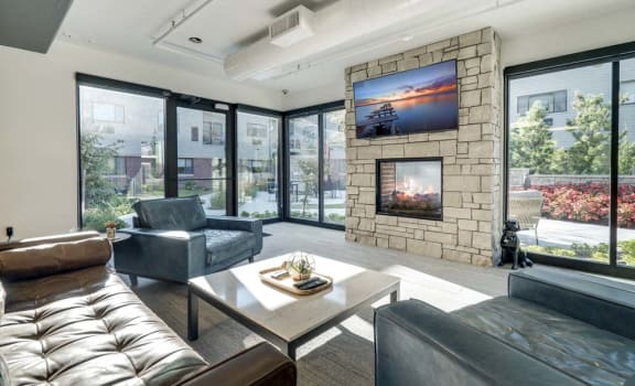 TV lounge with views of pocket park at The Conrad near UNMC in the Blackstone District Omaha NE 68105