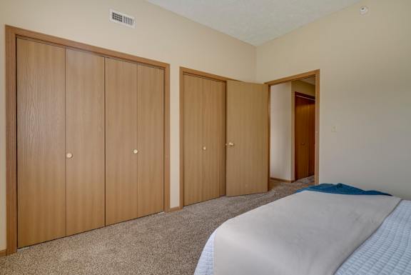 Two closets in the bedroom for storage at Pine Lake Heights apartments
