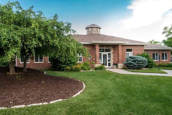 Exterior of clubhouse at Pinebrook Apartments