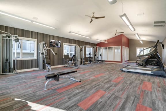 Large fitness center with cardio and strength equipment at Highland View