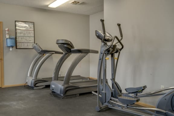 Elliptical and two treadmills in the fitness center at Skyline View