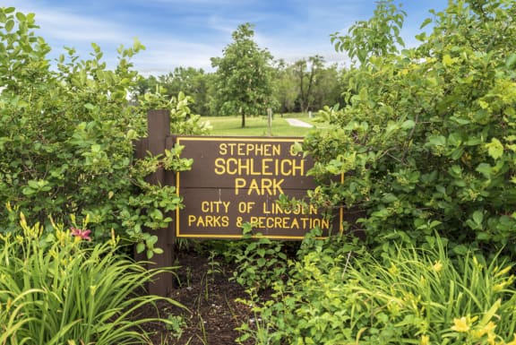 Stephen Schleich park site within greenery and flowers in Lincoln, Nebraska