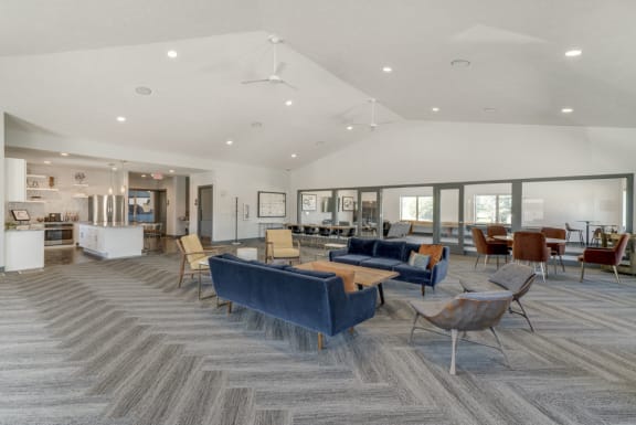 Great room with vaulted ceiling and multiple seating areas