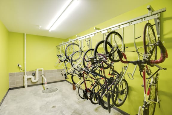 Wall with wall mounted rack for hanging bikes