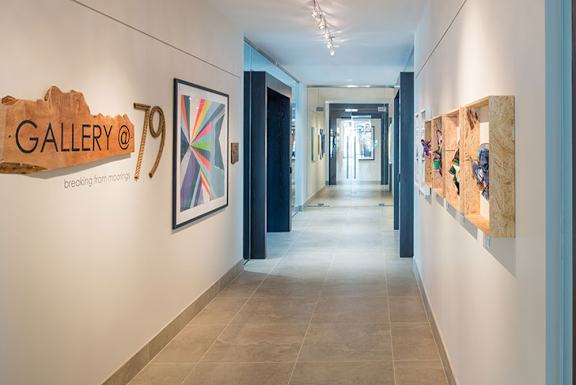 A hallway with a sign that says at Dock 79, District of Columbia, 20003