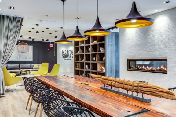 Community Room with Fireplace at North Square Apartments in Amherst, MA