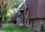 Thumbnail 11 of 13 - Sunrise Courts Apartments Side View Cambridge MN
