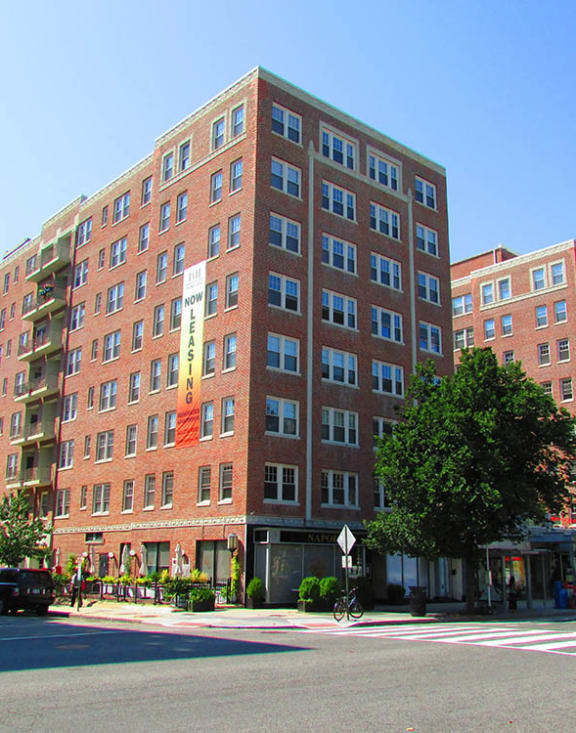 a large brick building on a city street at 1841 Columbia Road Apartments, Washington, 20009