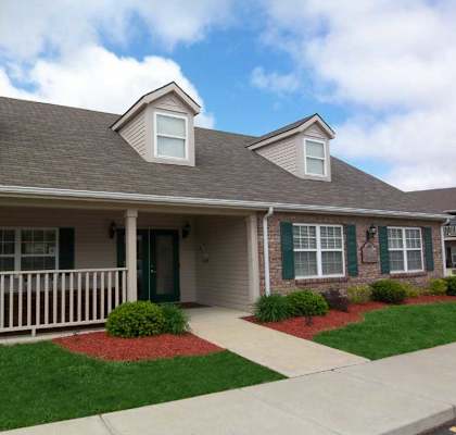 exterior view of the clubhouse at canterbury house apartments in warsaw indiana