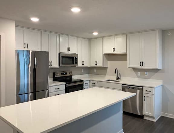 kitchen with white cabinets and stainless steel appliances
