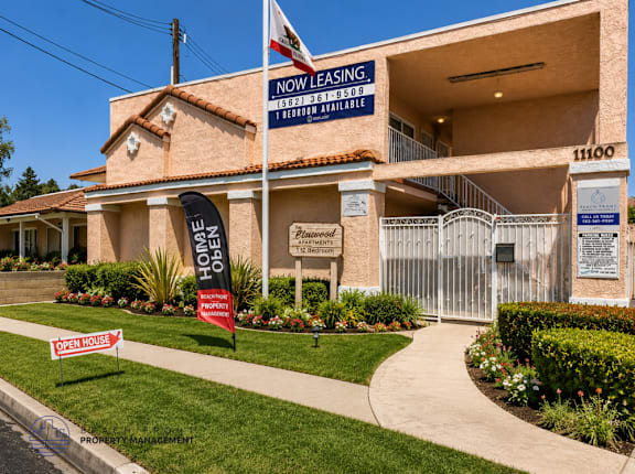 A building with a sign that says "Now Leasing" is shown.
