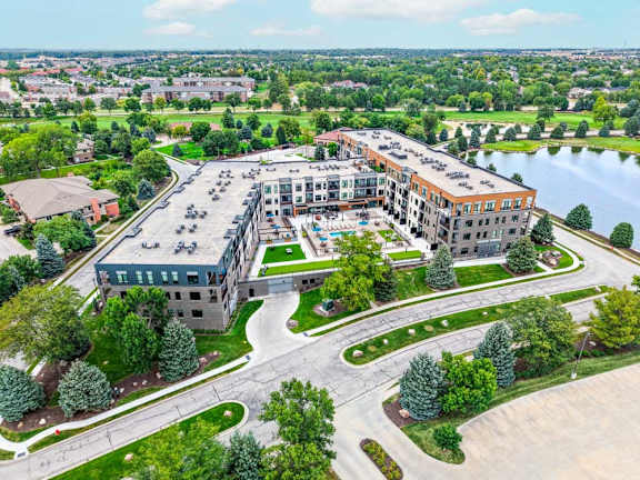 A luxury apartment building with a private courtyard next to the Wilderness Ridge golf course in the Wilderness Ridge neighborhood in Lincoln, NE.