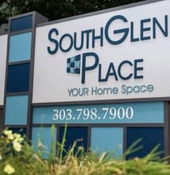 a sign place your home space in front of a building