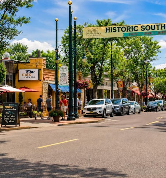 A street view of Historic South Gaylord with cars parked on the side.