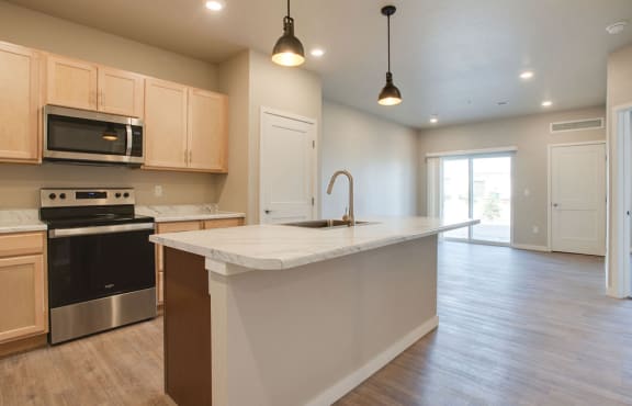 a living room with a couch and a coffee table at Pinehurst Apartments, Baxter, MN 56425