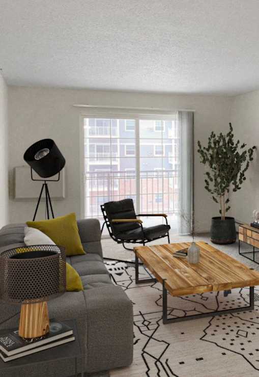 a living room with a couch and a coffee table and a tv