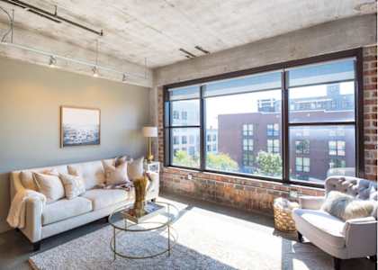 Modern-styled living room at Clemens Building, Des Moines, IA, 50309