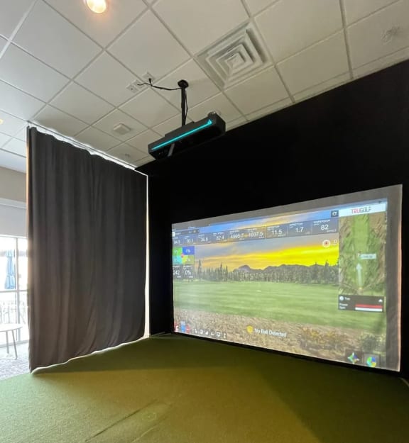 Golf Simulation Room at Metropolis Apartments in Innsbrook, VA