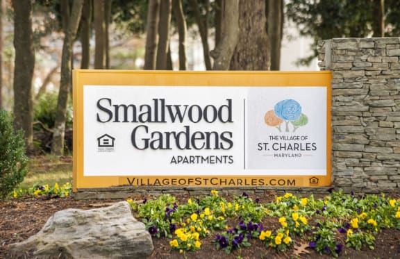 a sign for smallwood gardens apartments
