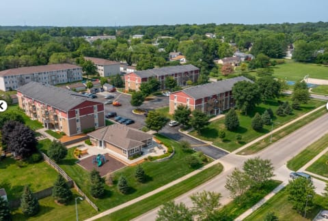 an aerial view of an apartment complex in the city