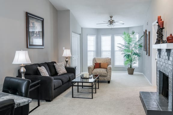 Large Windows in Carpeted Living Room