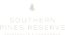 A logo with a tree and the words "Southern Pines Reserve Apartments & Townhomes" on a light background.