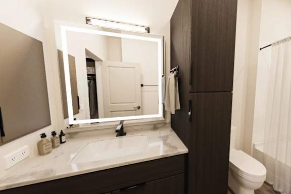 A bathroom with a white sink and a mirror.