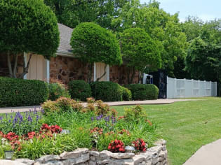 a house with a garden in front of it