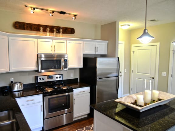 Stainless appliances in kitchen at Strathmoor Apartments , Ohio, 43016
