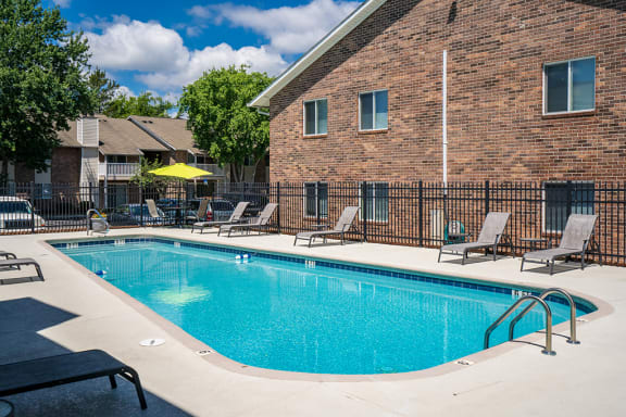 Lap Pool with Lounge Furniture Along the Sundeck