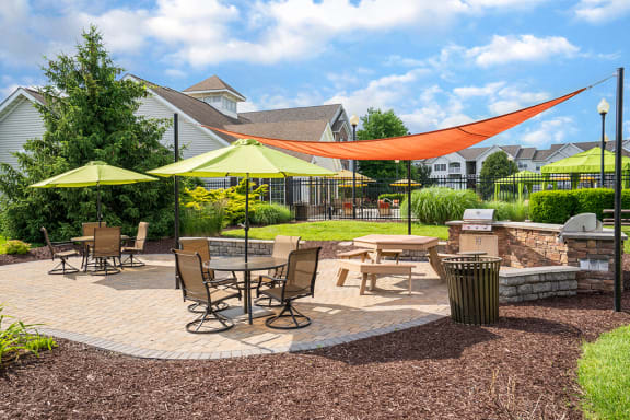 Outdoor Grilling Area with Outdoor Dining Tables