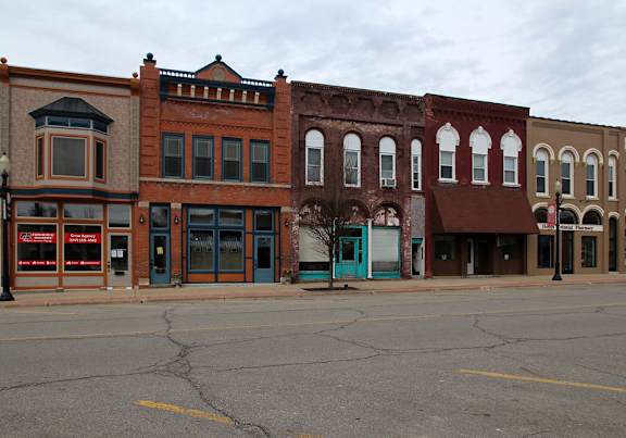 a building with a large neon sign on the front of it