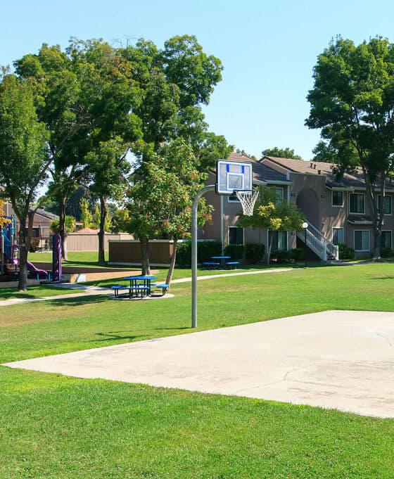 a basketball court in the middle of a grass field at Diablo Vista, Livermore