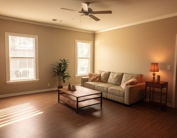 a living room with a couch and coffee table