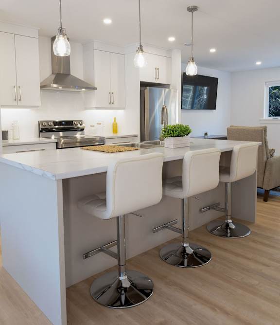 A modern kitchen with white chairs and a white counter.