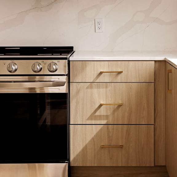 Fitted Kitchen With Island Dining at The Q Topanga, Woodland Hills
