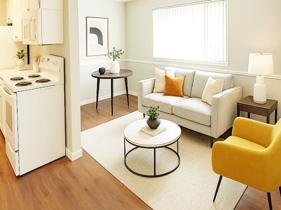 A living room with a brown couch and a ceiling fan.
