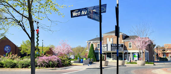 A street view with a sign that says West Ave.