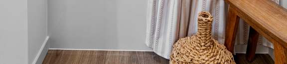 a bathroom with a shower curtain and a bath tub