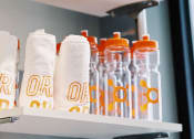 Thumbnail 13 of 14 - Shelf with Workout Towels and Water Bottles